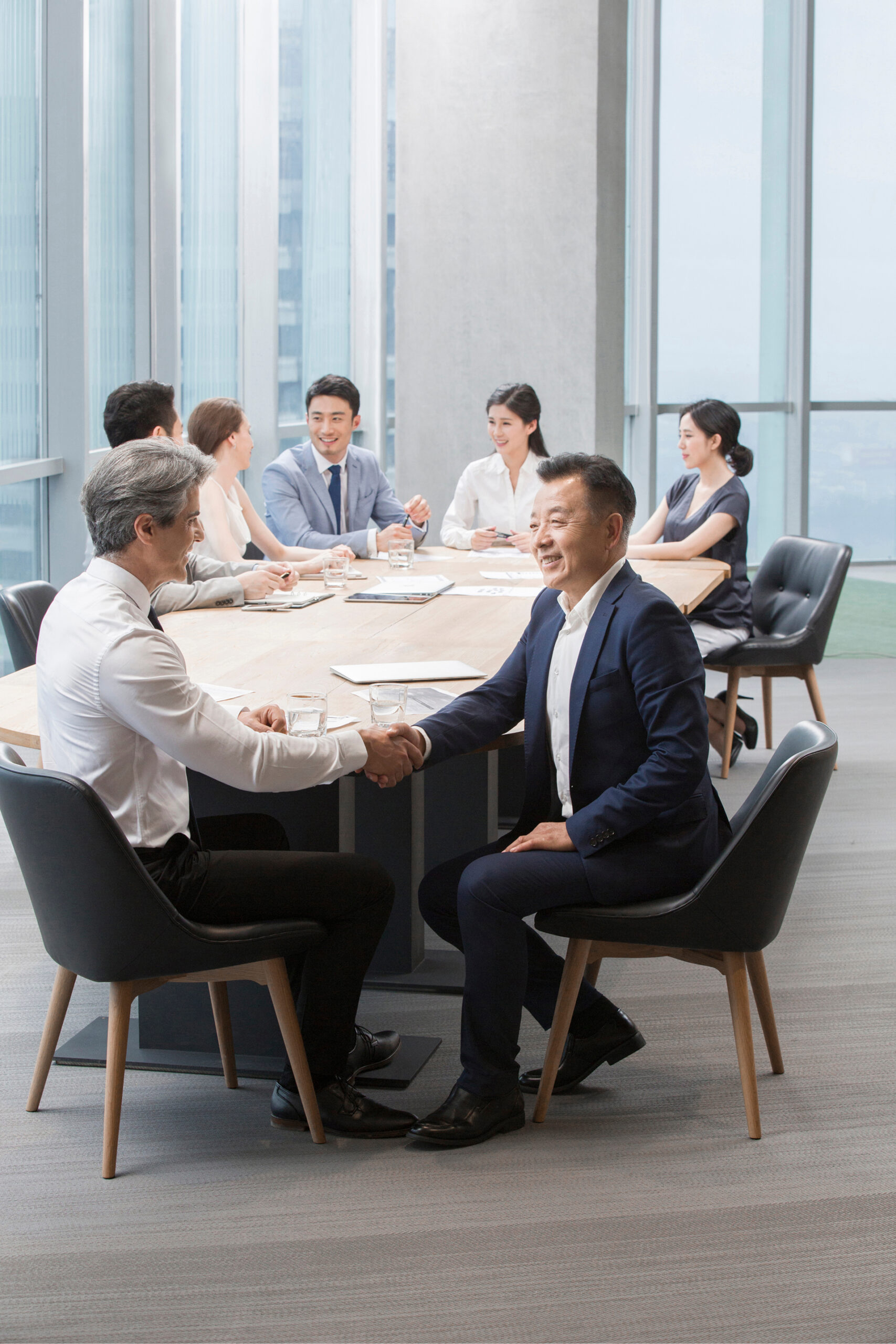 The future of B2B research – senior decision-makers in a boardroom meeting